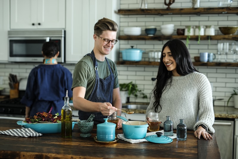 Family cooking together in a bright kitchen